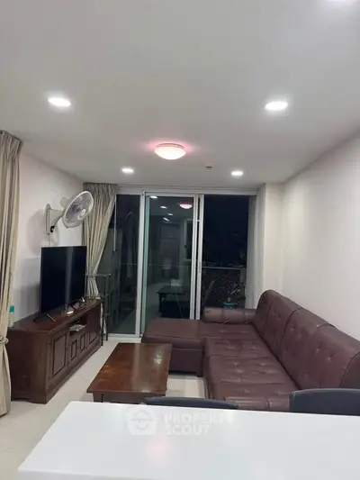 Spacious living room with modern decor and large sectional sofa