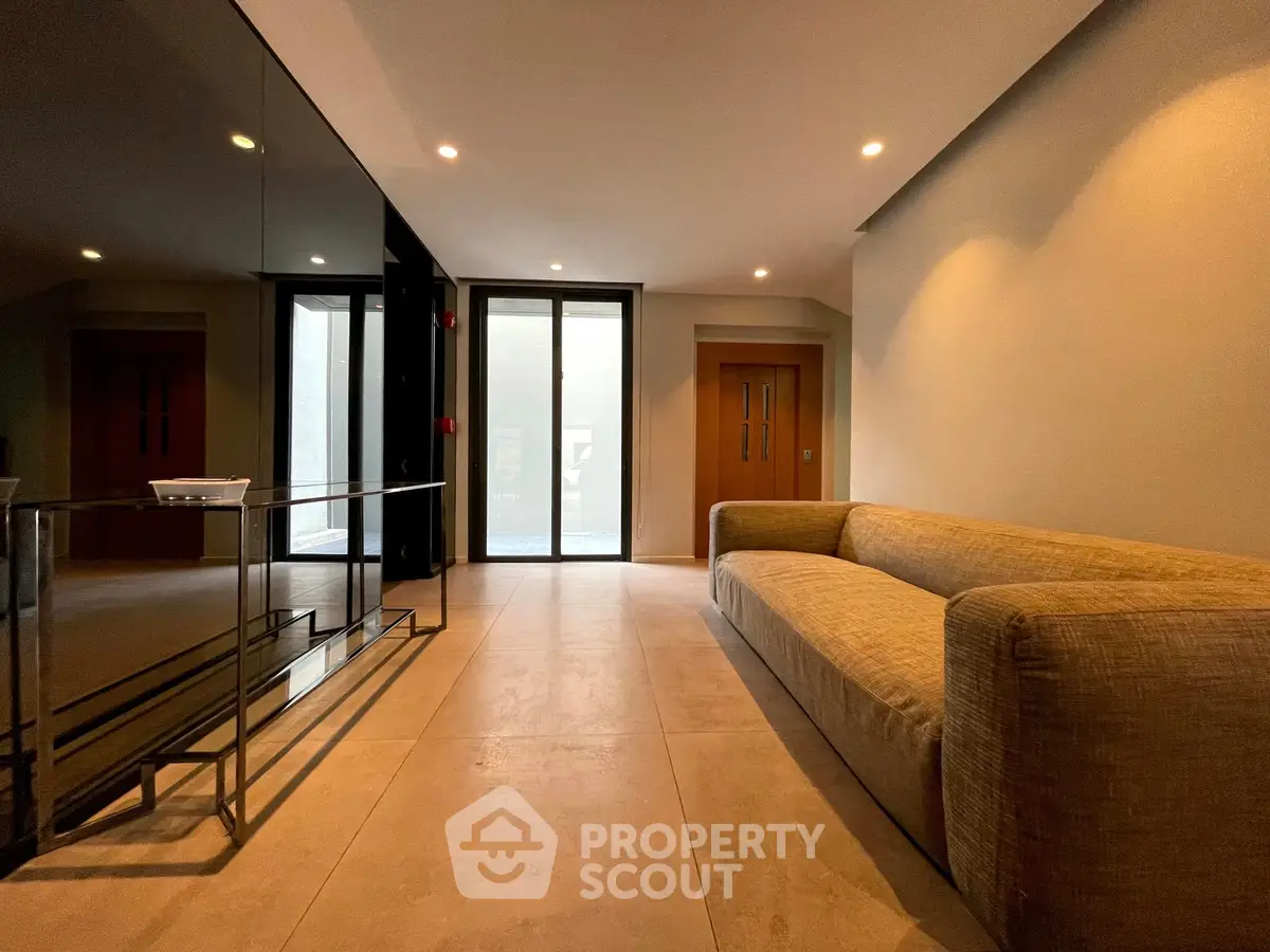 Modern living room with sleek design and comfortable sofa