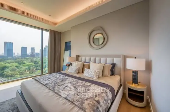 Luxurious bedroom with stunning city view and modern decor