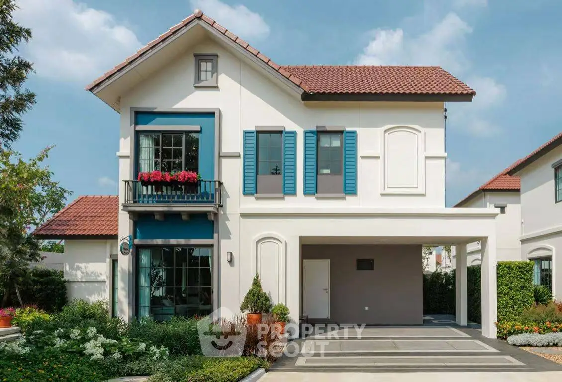Charming two-story house with red tile roof, blue shutters, and lush garden in a serene neighborhood.