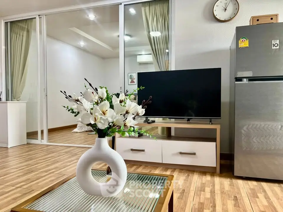 Modern living room with stylish decor and sleek appliances