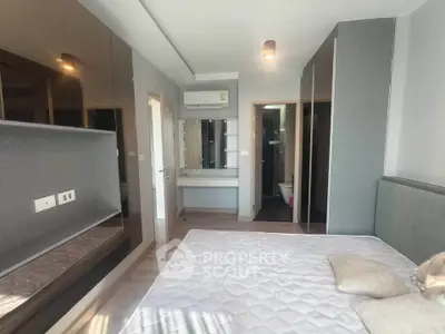 Modern bedroom with ensuite bathroom and sleek design