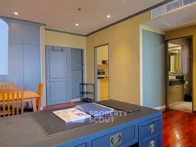 Spacious modern living area with elegant dining set and stylish decor