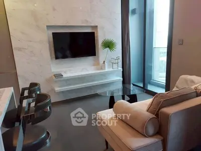 Modern living room with sleek design, featuring a wall-mounted TV, stylish furniture, and a large window with city view.