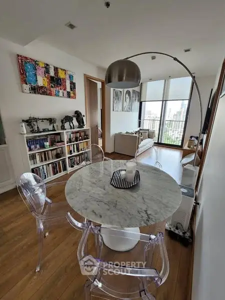 Modern living room with stylish dining area and city view