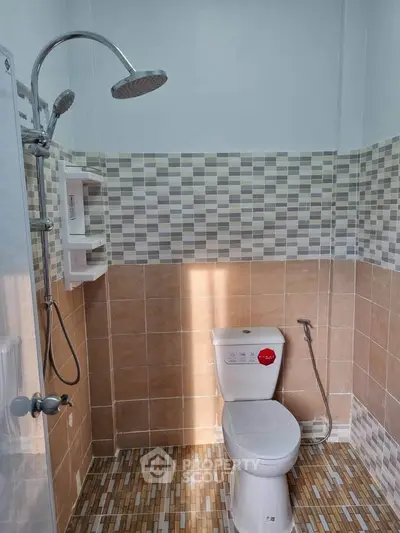 Modern bathroom with stylish tile design and rainfall showerhead