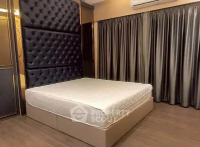Luxurious bedroom with elegant decor and plush bedding