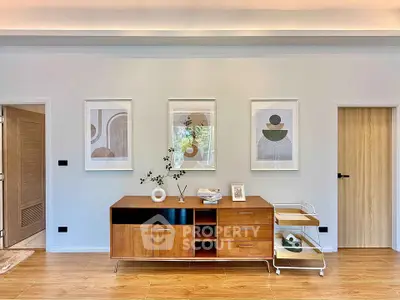Stylish modern living room with wooden furniture and minimalist decor