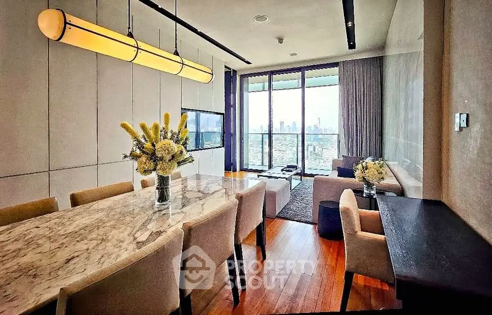 Luxurious living room with stunning city view and elegant dining area
