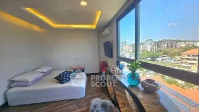Modern bedroom with large windows offering stunning city views and elegant decor.