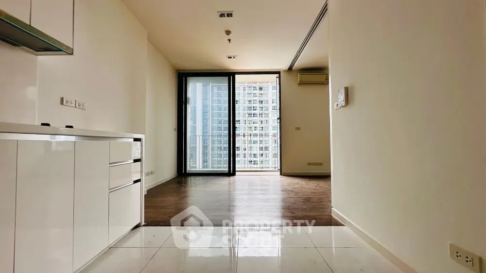 Spacious modern apartment with open layout and city view balcony