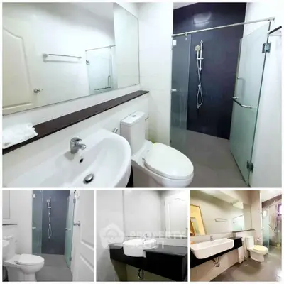 Modern bathroom with sleek fixtures and glass shower enclosure