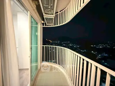 Stunning night view from a modern balcony with sleek railing design.