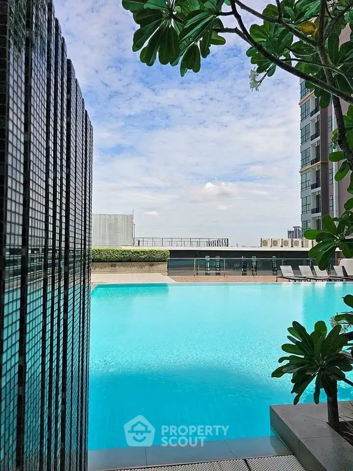 Luxurious rooftop pool with stunning city views and modern design, perfect for relaxation and leisure.