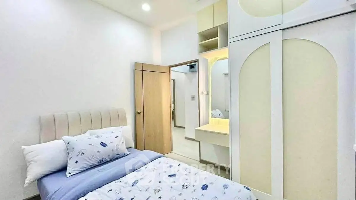 Cozy bedroom with modern wardrobe and soft lighting