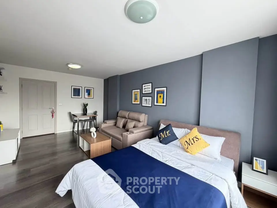 Modern studio apartment with stylish decor and cozy living area