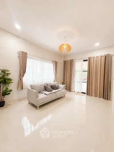 Bright and spacious living room with elegant decor and natural light