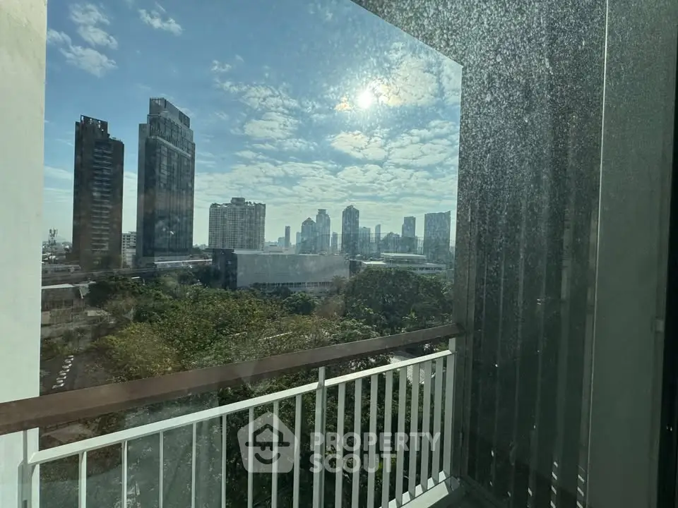 Stunning cityscape view from a modern balcony, perfect for urban living enthusiasts.
