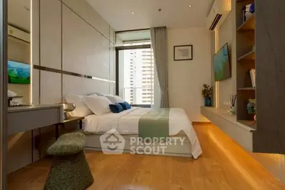 Modern bedroom with stylish decor and large window view