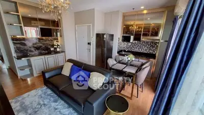 Luxurious modern living room with open kitchen and elegant decor