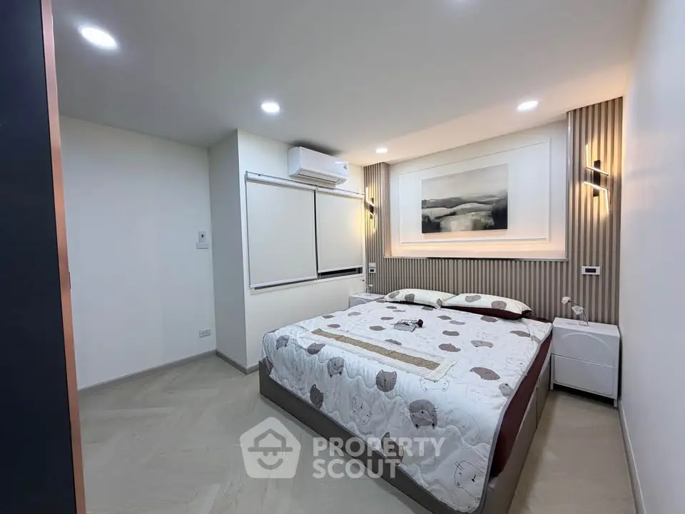 Modern bedroom with stylish decor and cozy ambiance