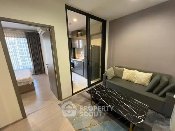 Modern apartment interior with stylish living room and kitchen view