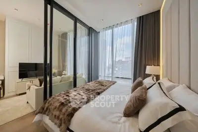 Luxurious modern bedroom with glass partition and elegant decor