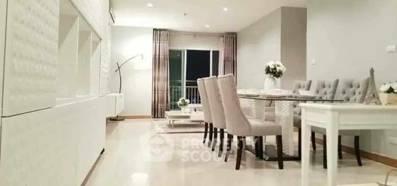 Elegant modern living room with dining area and stylish decor