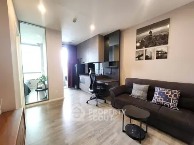 Modern living room with stylish decor and workspace