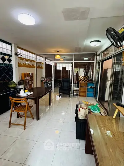 Spacious kitchen with open layout and modern appliances, perfect for culinary enthusiasts.