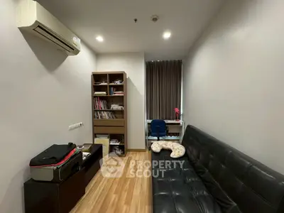 Cozy study room with modern furnishings and ample natural light, perfect for productivity and relaxation.
