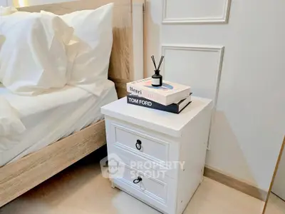 Stylish bedroom with elegant nightstand and modern decor