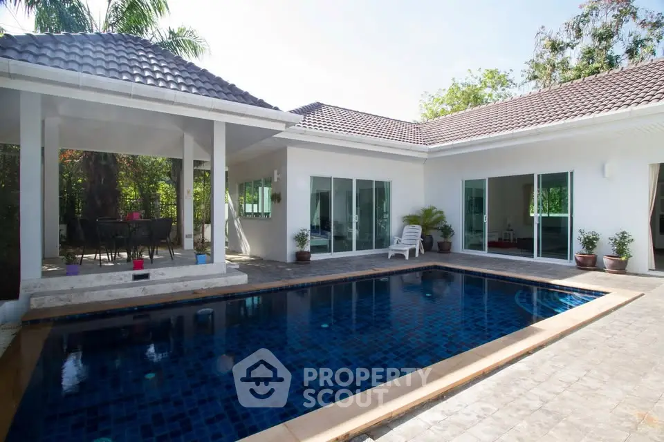 Stunning villa with private pool and spacious patio, perfect for luxurious outdoor living.