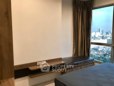 Modern bedroom with city view and elegant wooden furnishings