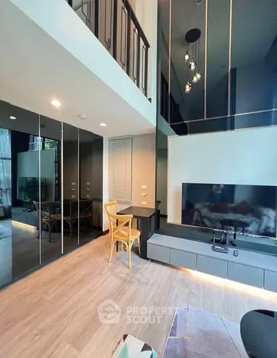Modern duplex living room with high ceilings and stylish decor