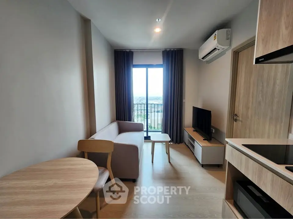 Modern living room with balcony view in stylish apartment