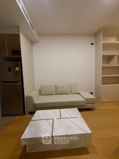 Modern living room with sleek sofa and marble coffee table