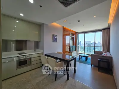 Modern open-layout living room with city view, featuring sleek kitchen and stylish dining area.
