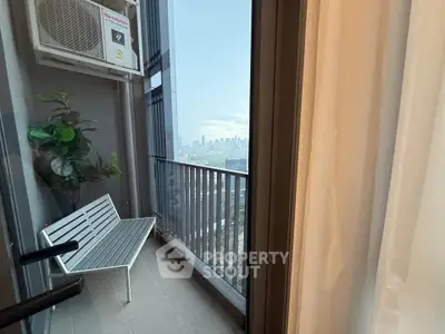 Chic urban balcony with city skyline view, perfect for relaxation and enjoying the outdoors.