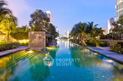 Luxurious urban pool with stunning cityscape views and lush greenery