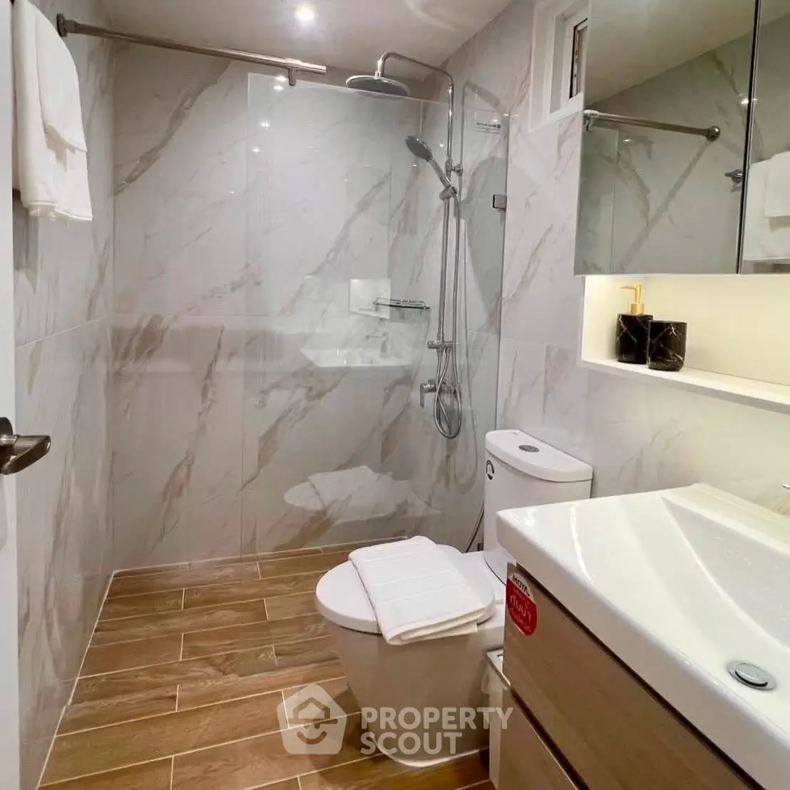 Modern bathroom with sleek fixtures and elegant marble tiles