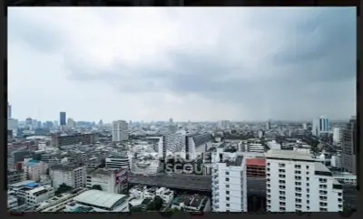 Stunning cityscape view from high-rise building showcasing urban skyline and architecture.