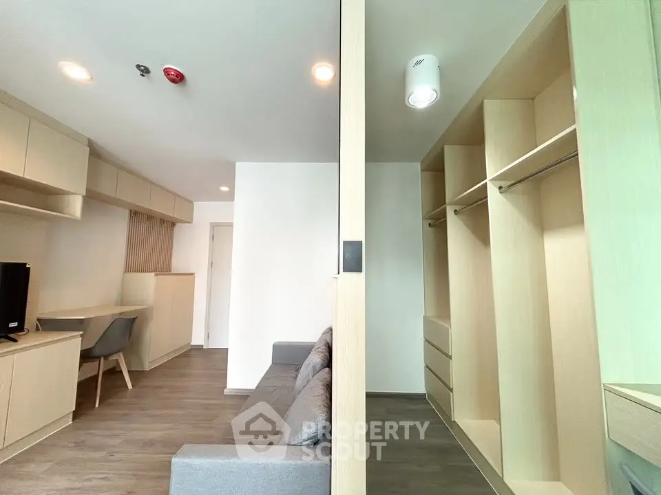 Modern living room with built-in storage and sleek design