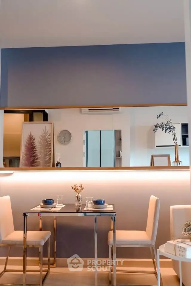 Modern dining area with elegant decor and stylish furniture in a contemporary apartment.