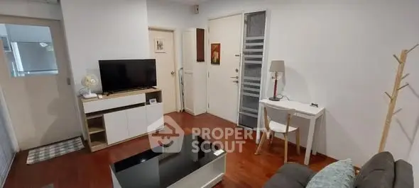 Cozy living room with modern decor and wooden flooring