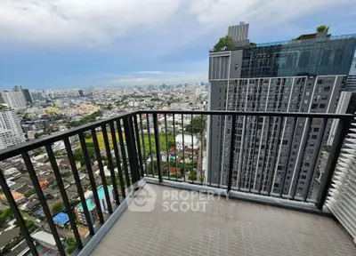 Stunning high-rise balcony view overlooking cityscape and skyline, perfect for urban living enthusiasts.
