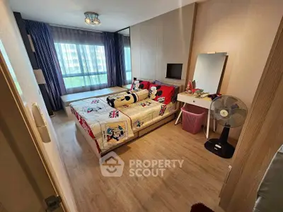 Charming bedroom with modern decor and ample natural light