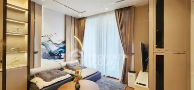 Luxurious living room with modern decor and large window, perfect for relaxation and entertainment.