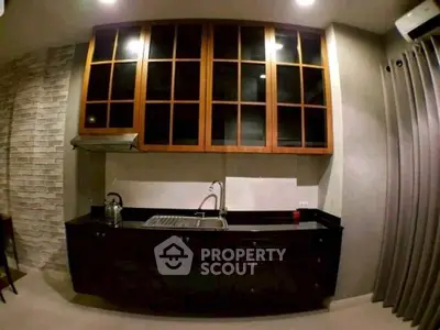 Modern kitchen with sleek cabinetry and stylish backsplash