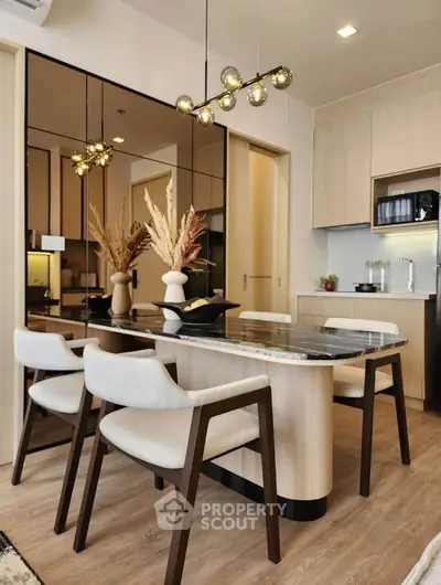 Modern dining area with elegant decor and open kitchen layout
